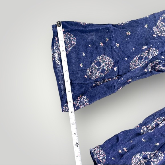 Torrid Blue Top Skulls Graphic - Picture 11 of 16